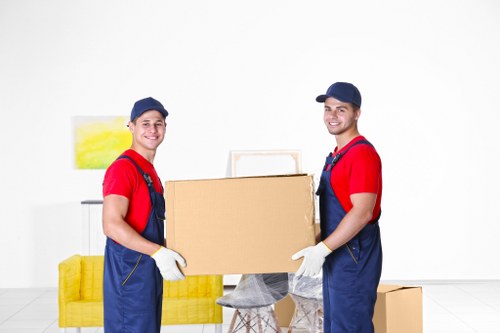 Moving van and packed boxes ready for a house move in Acton