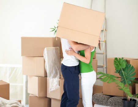 Local movers loading belongings for a move in Acton