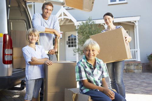 Removal van loading outside an Acton residential property