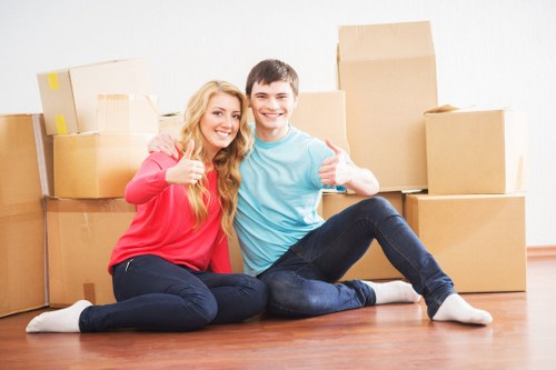 Professional Acton moving specialists managing a home relocation process
